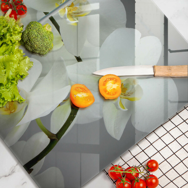 Steklena podloga za rezanje Cvetovi belih orhidej