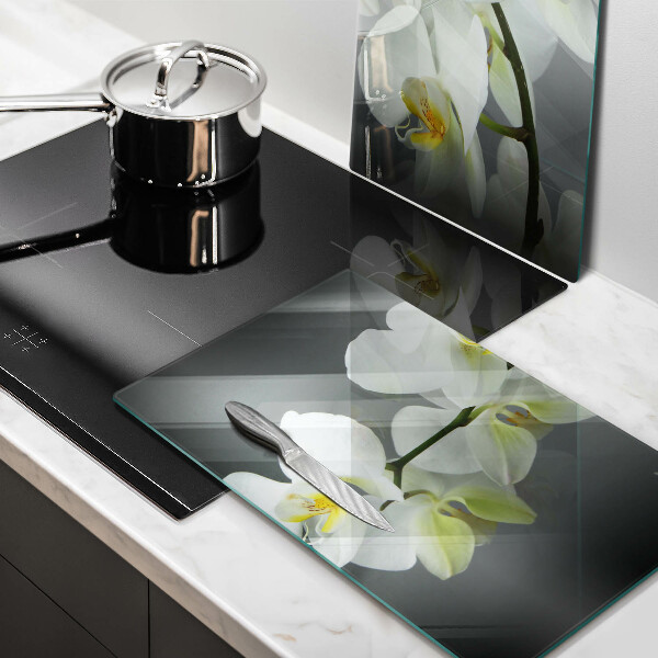 Steklena podloga za rezanje Cvetovi belih orhidej