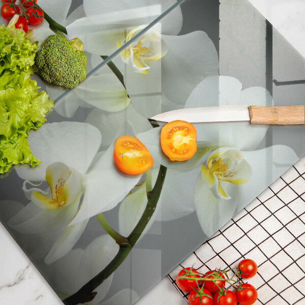 Steklena podloga za rezanje Cvetovi belih orhidej