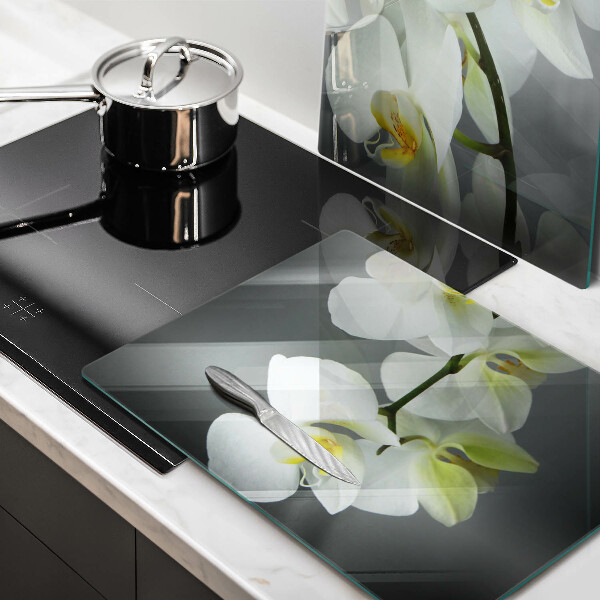 Steklena podloga za rezanje Cvetovi belih orhidej